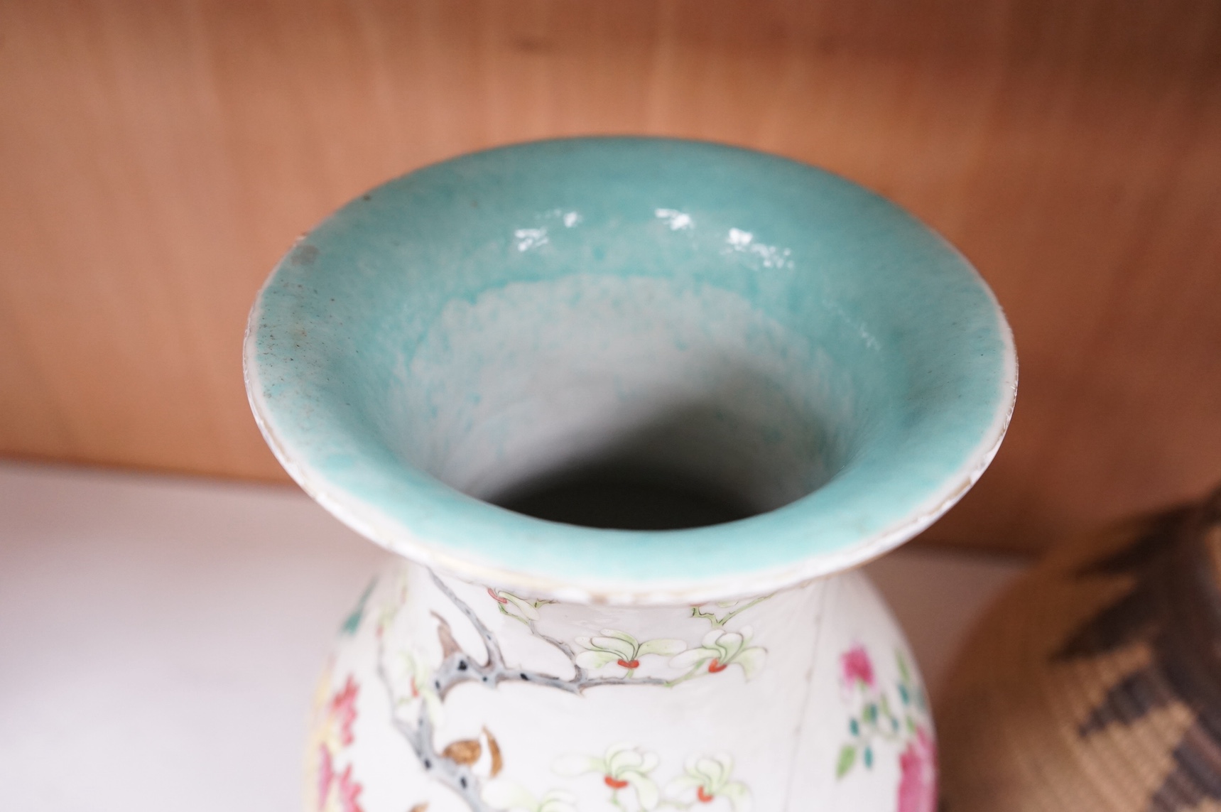 A mid 19th century Chinese famille rose vase together with other oriental and African wares, largest 33cm high. Condition - varies